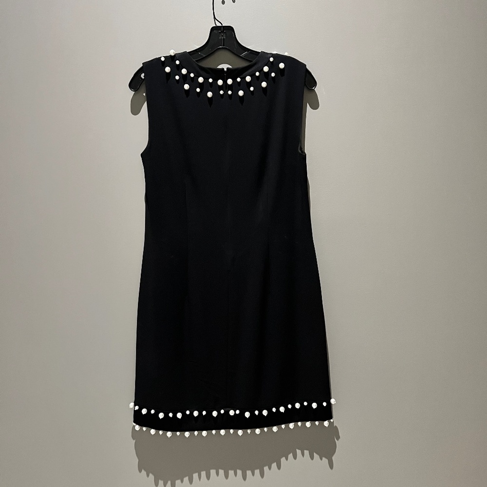 Sleeveless Women dress in black with pearls